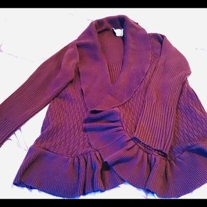 Outside Editions open, purple sweater
